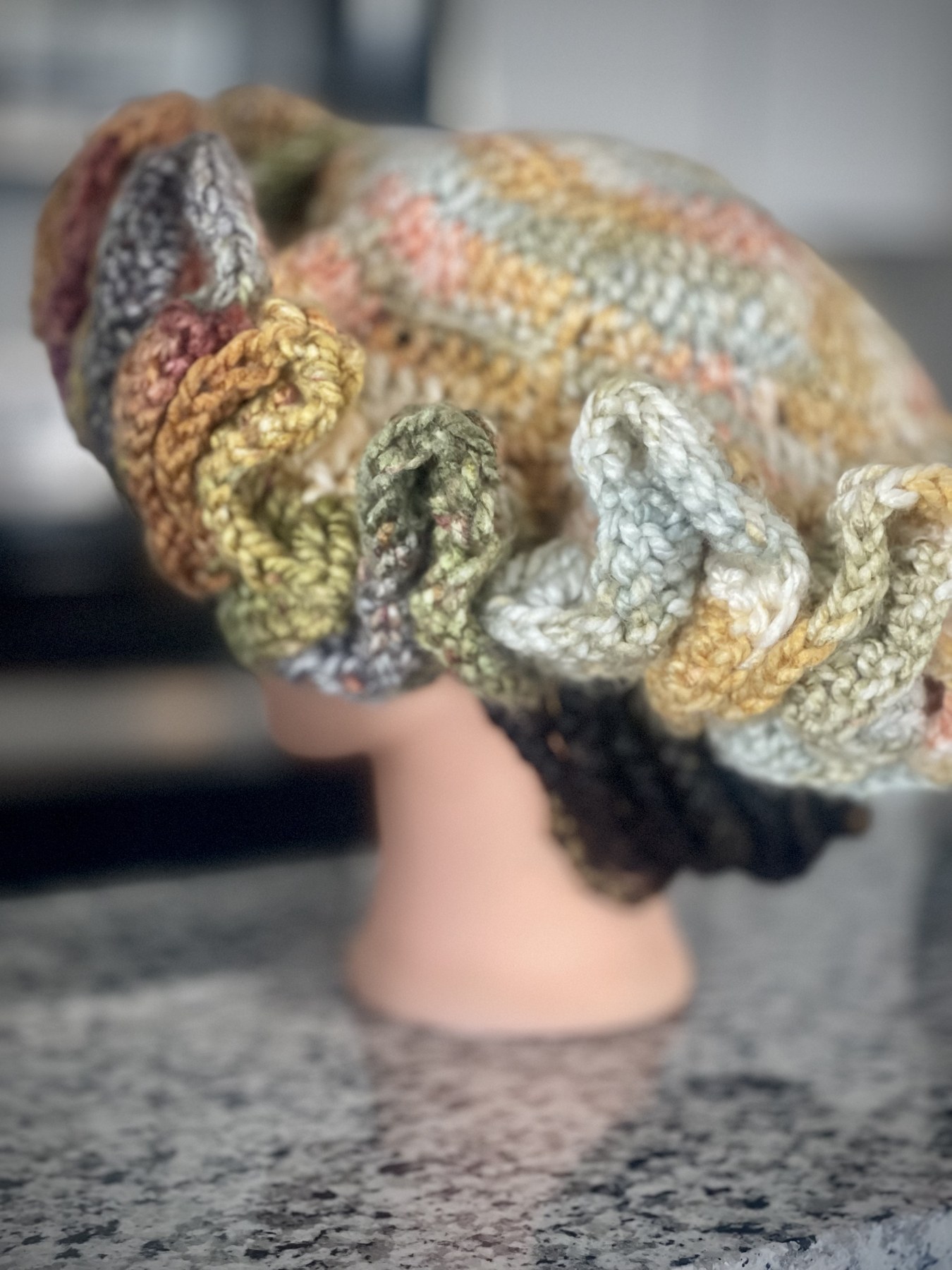 Close side view of the ruffled brim