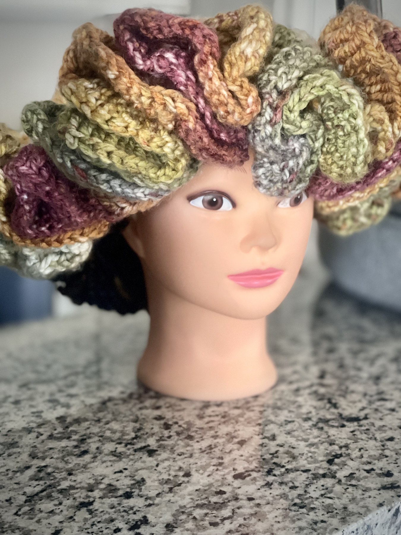 Angled view showing the colorful crochet ruffles